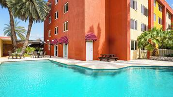 Outdoor pool, open 8:00 AM to 8:00 PM, pool umbrellas, pool loungers