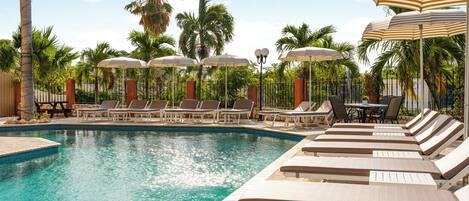 Outdoor pool, open 8:00 AM to 8:00 PM, pool umbrellas, sun loungers