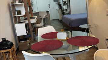 Deluxe Studio Suite, Balcony, City View | Minibar, blackout drapes, iron/ironing board, free WiFi