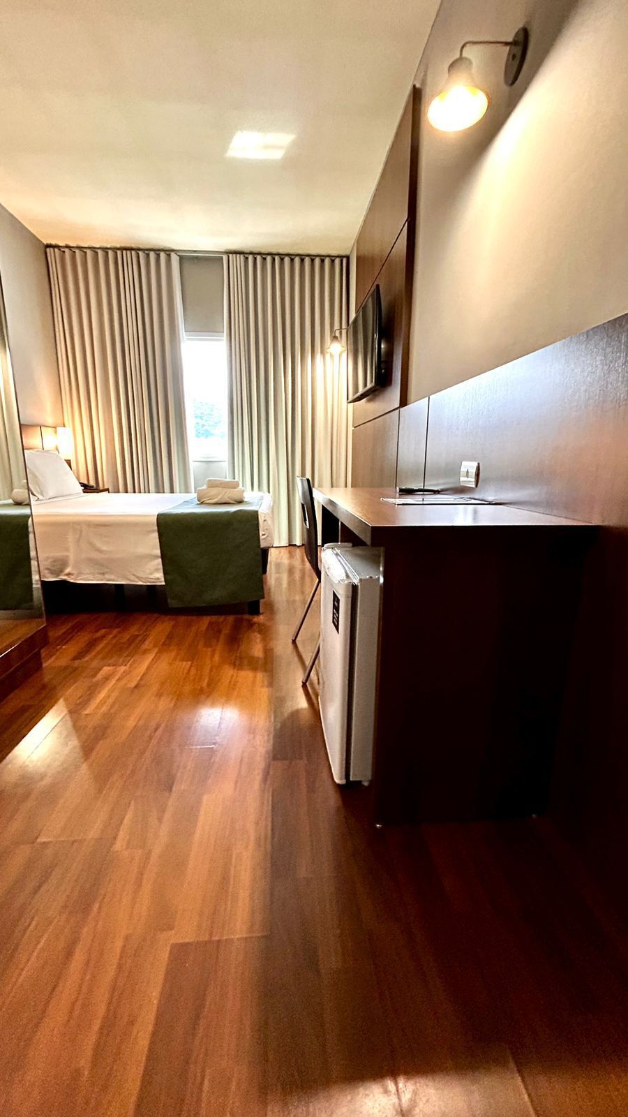 Deluxe Suite, City View | Desk, laptop workspace, blackout drapes, soundproofing