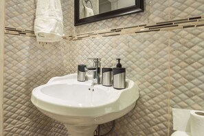 Hair dryer, towels, soap, toilet paper