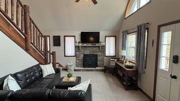 Smart TV, fireplace, DVD player, books