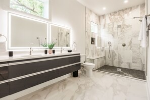 Deluxe Townhome | Bathroom | Combined shower/tub, hair dryer, towels, soap - The Row on West Iris (Nashville)