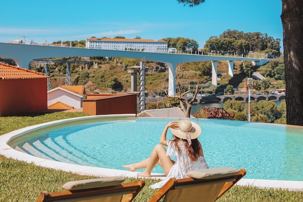 Outdoor pool, open 9:00 AM to 8:00 PM, pool umbrellas, sun loungers