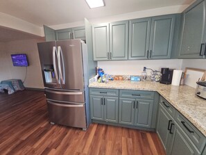 Microwave, oven, stovetop - The LA. Lodge Charming 2 Bedroom Fishing/Hunting Camp in Venice, La. (Buras)