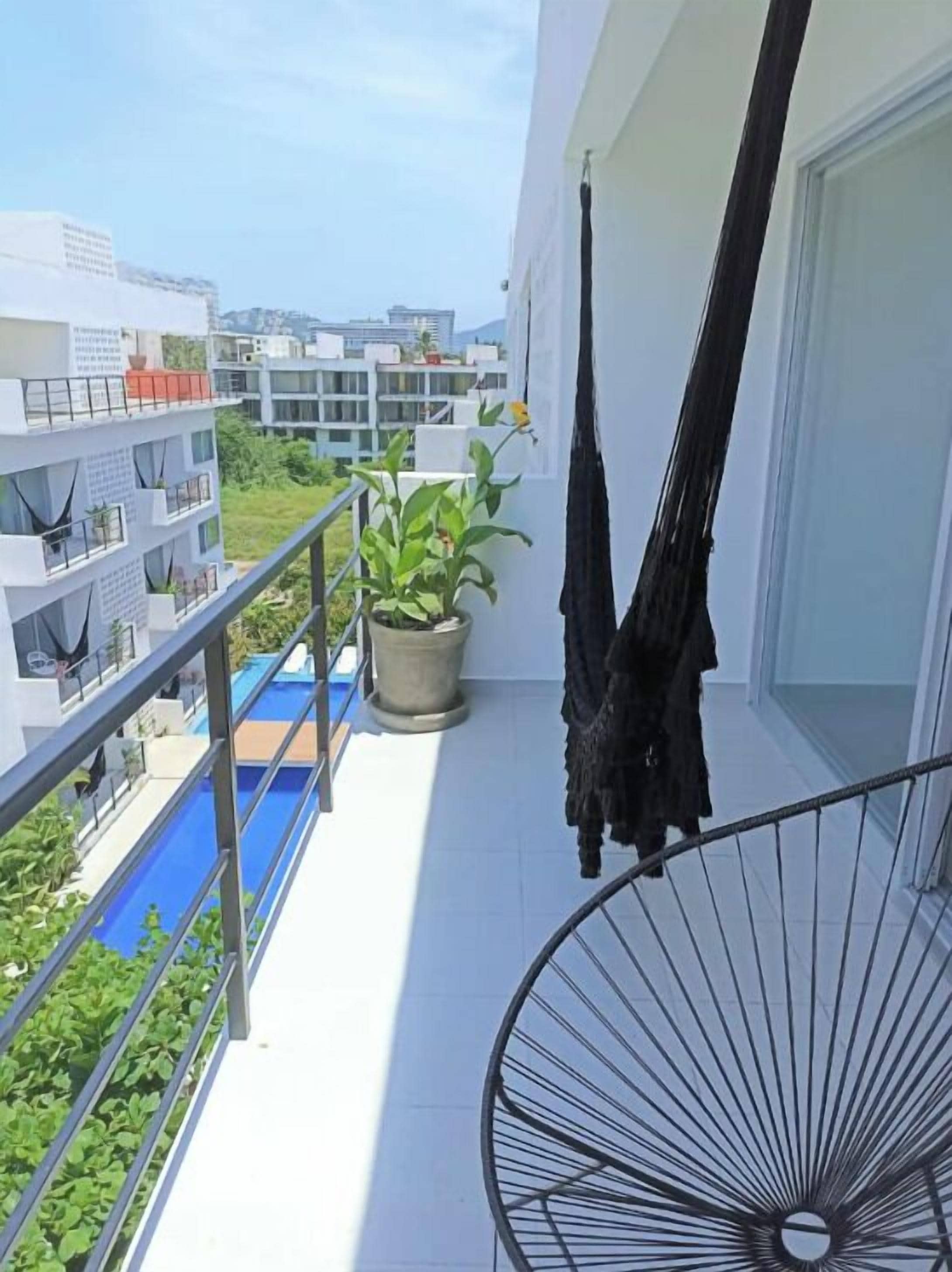 Suite Deluxe, balcón, vista al jardín | Balcón