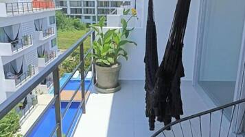 Suite Deluxe, balcón, vista al jardín | Balcón