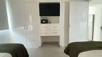 Suite Deluxe, balcón, vista al jardín | Ropa de cama de alta calidad y decoración personalizada