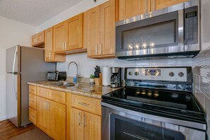 Microwave, coffee/tea maker, cookware/dishes/utensils