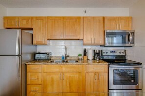 Microwave, coffee/tea maker, cookware/dishes/utensils