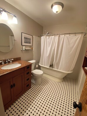 Shower, towels, toilet paper