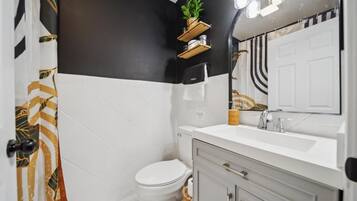 Hair dryer, towels, soap, shampoo