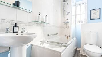 Hair dryer, towels, soap, shampoo