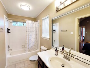 Hair dryer, towels, soap, shampoo