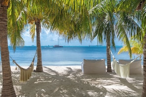 Private beach, white sand, sun-loungers, beach towels