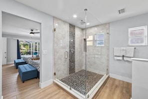 Shower, hair dryer, towels, soap