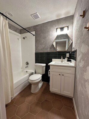 Hair dryer, towels, soap, shampoo