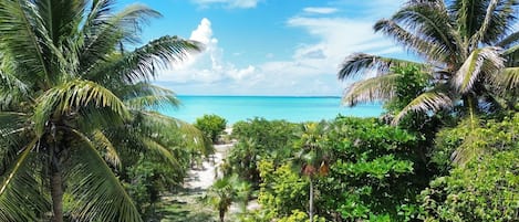 On the beach, sun-loungers, beach towels