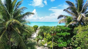 On the beach, sun-loungers, beach towels