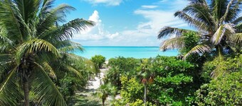 NEW 2 bdrm Sunrise Villa on 1+ acre tropical garden directly on Hoopers Beach