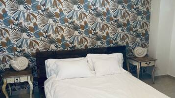 3 habitaciones, tabla de planchar con plancha, wifi y ropa de cama