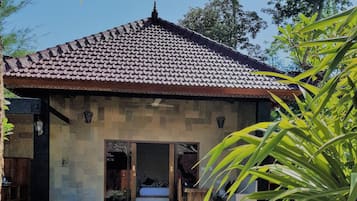 Deluxe Villa, 1 Bedroom, Pool View, Garden Area | 1 bedroom, in-room safe, desk, laptop workspace