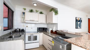 Fridge, microwave, coffee/tea maker, electric kettle