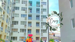 Children's play area - outdoor - Davao Condo 2BR Unit Pool Wi-Fi Netflix (Davao)