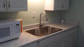 Fridge, microwave, coffee/tea maker, toaster