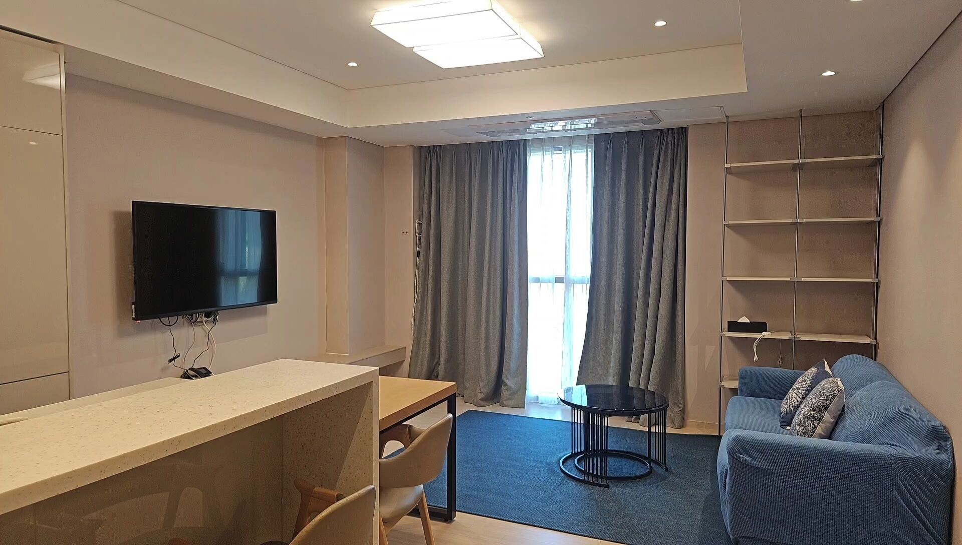 Residence connecting suite room | Living area | 96-cm TV with cable channels, printers
