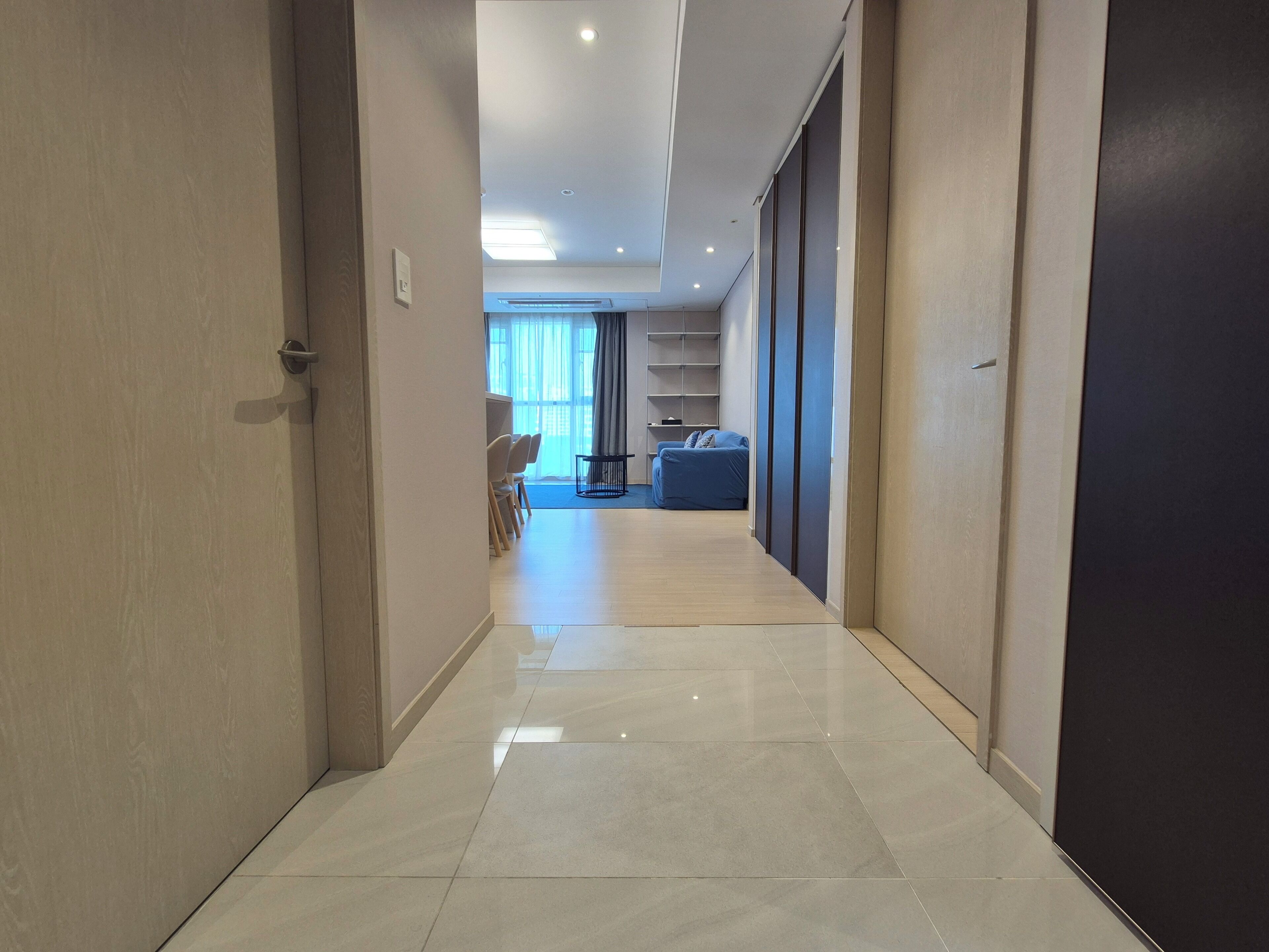 Residence connecting suite room | Living area | 96-cm TV with cable channels, printers