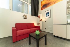 Living area - GuestHost - Galaxy Lofts - Appt Uranus x4 (Torino)