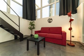 Living area - GuestHost - Galaxy Lofts - Appt Uranus x4 (Torino)