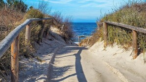 A sandy path leading to the sea with wooden railings on both sides. - Wooden Summer Houses, Bobolin (Darlowo)