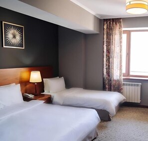 Familie driepersoonskamer | Een kluis op de kamer, geluiddichte muren, gratis wifi