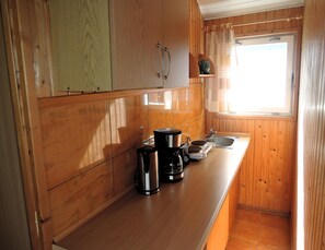 Bungalow | Cocina privada | Tetera eléctrica y tostadora 