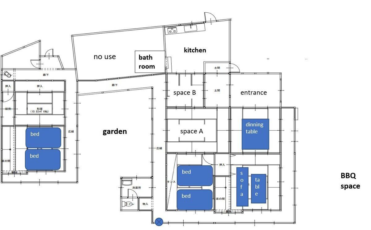 A floor plan with a garden, kitchen, bathroom, and BBQ space.