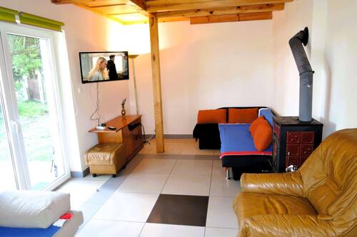 Ferienhaus | Wohnzimmer | Kamin