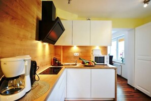 Apartment | Private kitchen | Electric kettle, toaster, highchair - Comfortable 3-room Apartment Close to the sea (Ustronie Morskie)