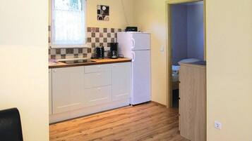 Bungalow | Dapur pribadi | Ketel listrik, pemanggang roti, dan kursi makan untuk bayi