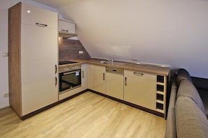 Apartment | Private kitchen | Electric kettle, toaster, highchair