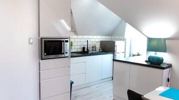 Apartamento | Cozinha privada | Cadeirão de bebê