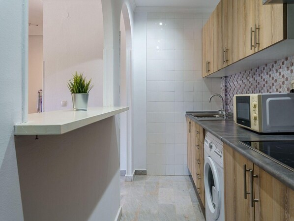 Appartement | Cuisine privée | Chaise haute