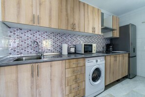 Appartement | Cuisine privée | Chaise haute