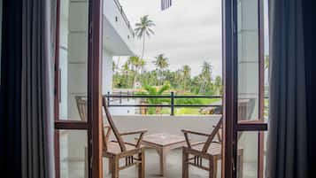 Luxury Double Room, Partial Sea View | Desk, laptop workspace, iron/ironing board, free WiFi