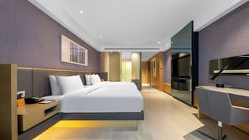 Habitación Deluxe con 2 camas individuales | Minibar, escritorio, cortinas opacas y sistema de insonorización