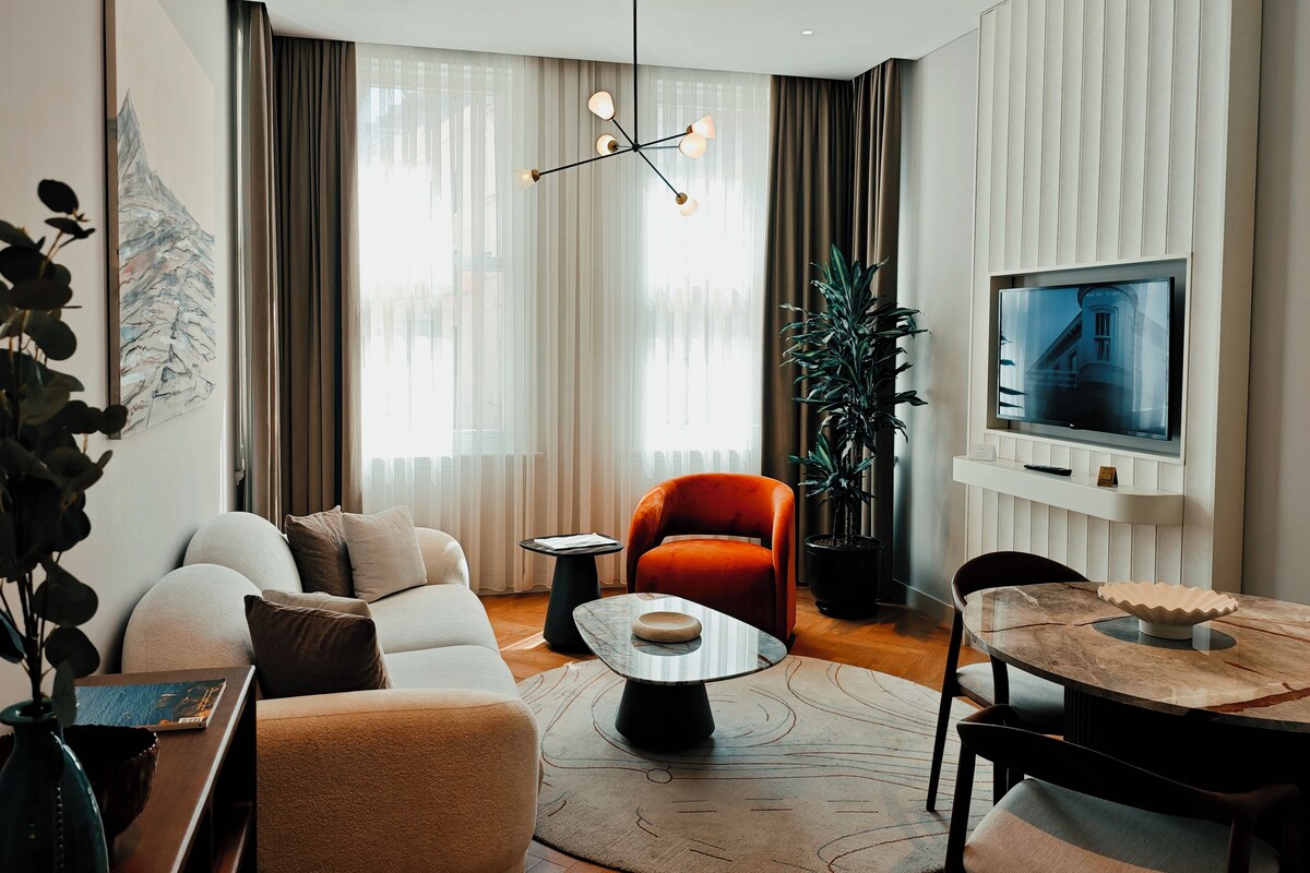 Suite, 2 Bedrooms (French Balcony) | Living area | 43-inch LED TV with satellite channels