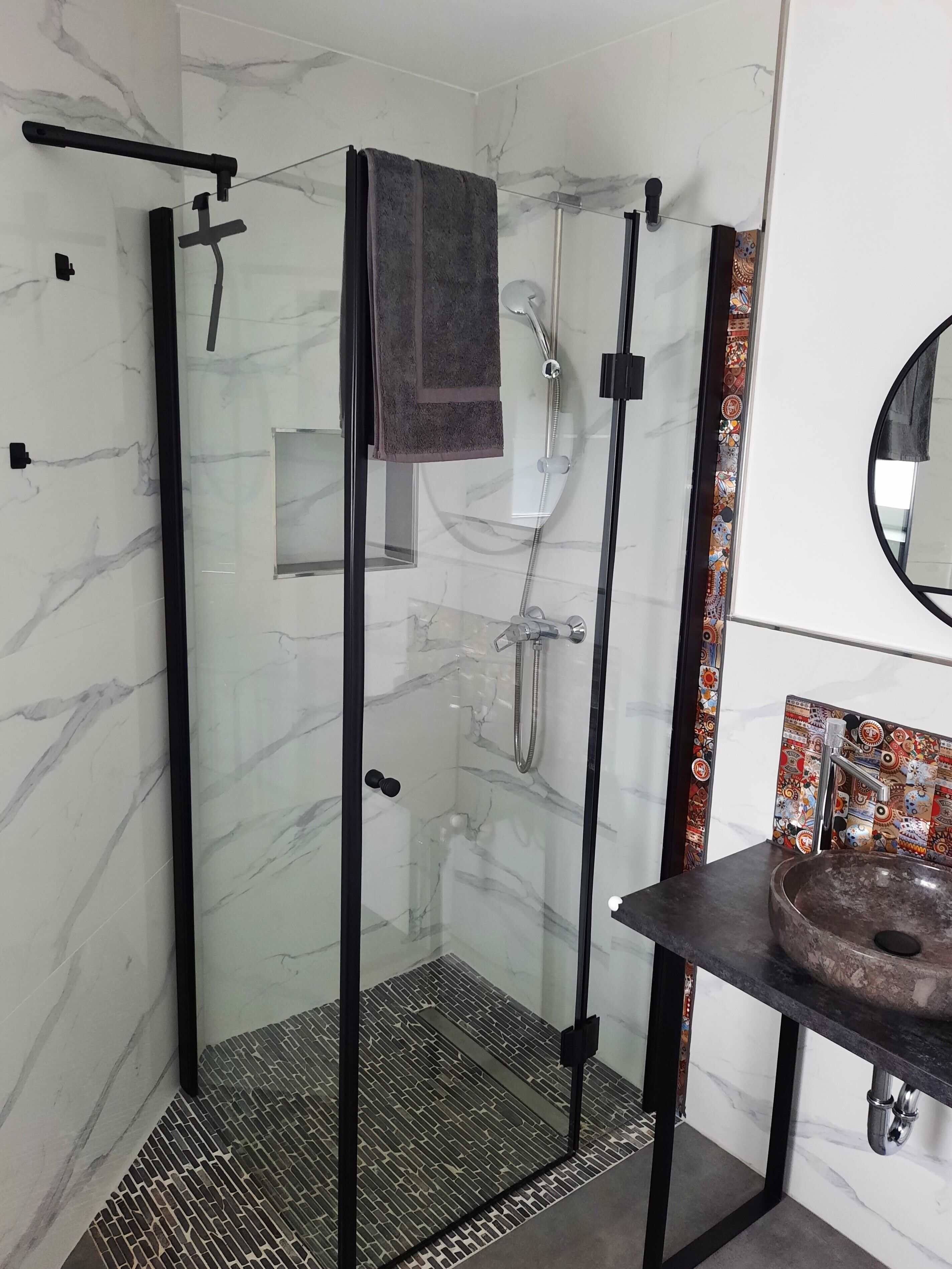 Shower, hair dryer, towels, soap