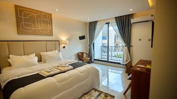 Executive Room, Pool View | 1 bedroom, desk, iron/ironing board, free WiFi