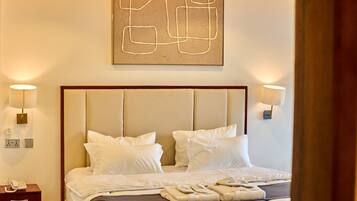 Executive Room, Pool View | Premium bedding, desk, iron/ironing board, free WiFi